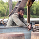Noah (Aldis Hodge) leaning over the side of a boat in Underground
WGN